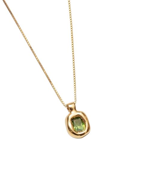 A NEW EVERYDAY FAVORITE WHAT IT IS: Elegant 14k gold vermeil necklace featuring a lab-created green sapphire WHY IT’S SPECIAL: This versatile piece serves as the perfect everyday staple We love the pop of mesmerizing green GOOD TO KNOW: 18" 14k Gold vermeil box chain14k Gold plated brass pendant with a lab-created green sapphire gemstone WHY WE LOVE WOLF CIRCUS: This line of demi-fine jewelry is crafted by hand in Vancouver, BC using a hand fabricated technique or the intricate lost-wax process. Silver And Emerald Necklace, Everyday Pendant Necklace, Green And Gold Jewelry, Everyday Gold Necklace, Elegant Gold Jewelry, Jewelry Accessories Necklaces, Green Sapphire Necklace, Necklaces Gemstone, Minimalist Gold Necklace