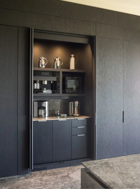 eggersmann pocket door units are incredibly flexible. They can be customized in width, depth, height and operate fluidly at any size. The ability to create multipurpose spaces without making your cabinetry look like it is out of place is just one use. Build in your favorite coffee bar, beverage center, desk area, buffet, or even conceal your ovens. Challenge us to create a pocket door solution for your special need. Hidden Coffee Bar, Kaffe Station, Built In Coffee Bar, Coffee Bar Ideas Kitchen Counter, Coffee Station Kitchen, Coin Café, Coffee Area, Coffee Bar Design, Hidden Bar