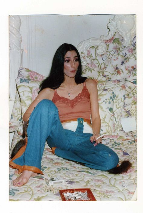 Cher On A Bed In Bell Bottoms And A Camisole, Smoking A Cigarette 70s Cher, Cher 70s, Cher Fashion, Cher Outfits, 70’s Aesthetic, Cher Photos, Outfits 70s, 70s Inspired Fashion, 70s Outfits