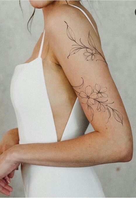 240+ Vine Tattoos For Guys and Females (2022) - TattoosBoyGirl Aries Female, Wrap Around Tattoo, Around Arm Tattoo, Wrap Tattoo, Stylish Tattoo, Head Tattoo, Vine Tattoos, Anchor Tattoo, Classy Tattoos