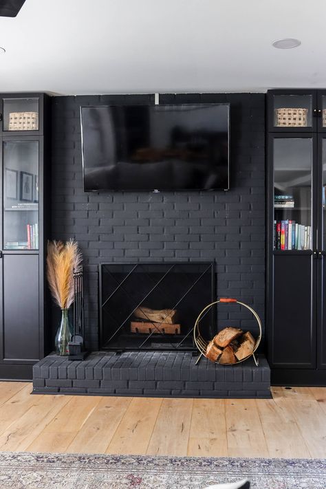 Fireplace Built Ins Black, Black Fireplace With Tv Above, Bookshelf Around Fireplace, Black Fireplace With Built Ins, Black Built Ins Living Room, Built In Bookshelves Around Fireplace, Diy Built In Bookshelves, Black Fireplace Wall, Bookshelves Around Fireplace