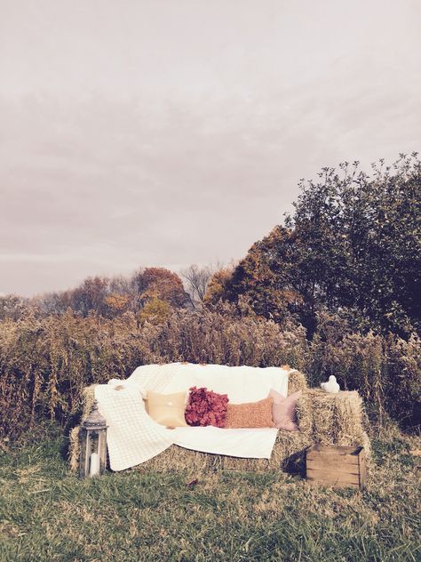 Fall mini session hay bales family leaf filter pillows red orange yellow fall scenery candles trees crates mums photography photos sky outdoors Fall Pictures Props, Hayride Photoshoot, Fall Photoshoot Hay Bales, Thanksgiving Mini Session, Thanksgiving Mini Photo Session, Fall Photo Backdrop Ideas Outdoor, Fall Photography Set Up, Hay Bales Photoshoot, Fall Outdoor Photoshoot Setup