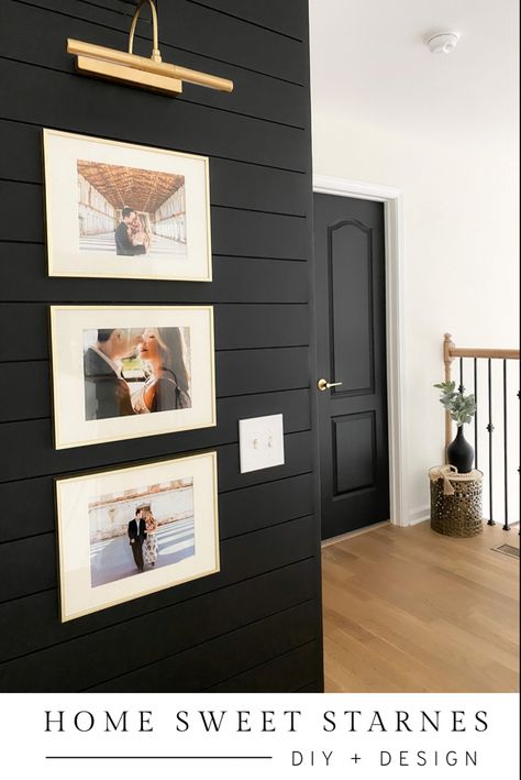 Black Wall Hallway Ideas, Black Shiplap Wall Decor, Black Shiplap Hallway, Bold Shiplap Wall, Small Accent Wall Hallway, Black Accent Wall With Picture Frames, Light Grey Walls With Black Accent Wall, White And Black Shiplap, Small House Accent Wall