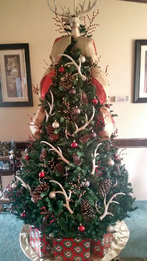 My Beautiful Deer Antler Christmas Tree! Deer Theme Christmas Tree, Deer Antler Christmas Tree Decor, Western Tree Ornaments, Antlers In Christmas Tree, Deer Antler Christmas Tree Topper, Christmas Tree With Deer Antlers, Rustic Deer Christmas Tree, Antler Tree Christmas, Antler Christmas Tree Topper