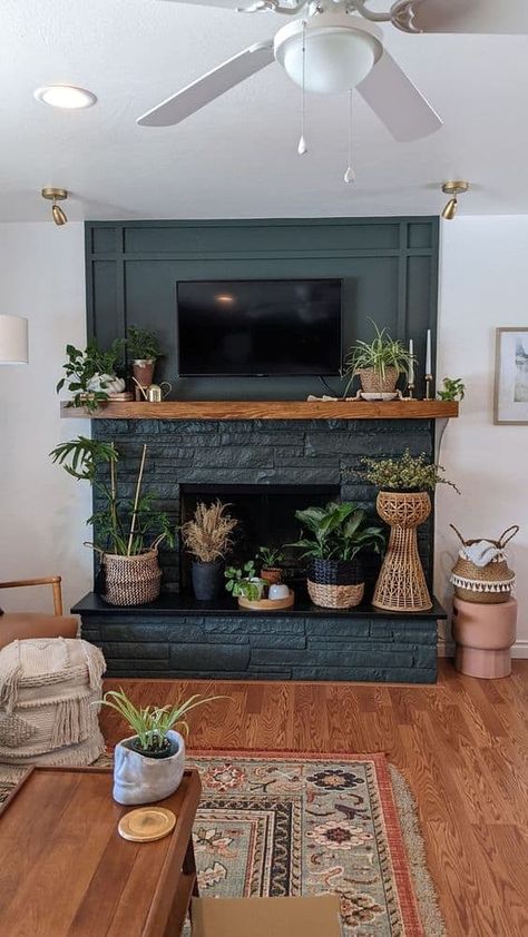 Dark Green Fireplace, Moody Living Room Decor, Fireplace Garland Christmas, Dark And Moody Living Room, Green Fireplace, Plum Walls, Dark Accent Walls, Moody Living Room, Fireplace Garland