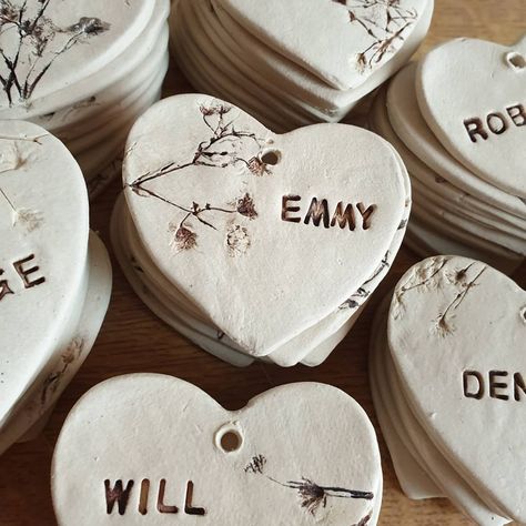 Charlotte Hupfield Ceramics on Instagram: “More wedding favours made and posted to the couple ready for their wedding in August 💞 #weddingfavours #ceramicweddingfavours…” Pottery Wedding Gifts Handmade, Diy Wedding Guest Favors, Ceramic Wedding Gifts For Guests, Air Dry Clay Wedding Favours, Ceramic Place Cards, Homemade Wedding Favours, Wedding Ceramics Gift Ideas, Ceramic Wedding Favours, Wedding Gift Ceramic