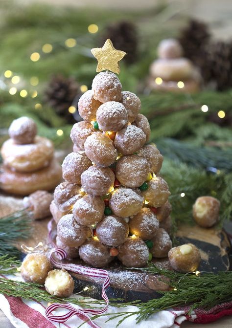 How to make a croquembouche using donut holes.  Easy Christmas Croquembouche tower. Mini DIY Croquembouche as a centerpiece #preppykitchen #croquembouche https://preppykitchen.com/doughnut-croquembouche/ Donut Tree, Christmas Donuts, Doughnut Holes, Preppy Kitchen, Easy Meal Ideas, No Cooking, Trending Recipes, Mini Donuts, Spiced Rum