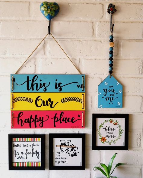 VIOLETVIBES® on Instagram: “We had to create a combo around our best selling multi tier wall hanging : 'This is our happy place' We will call it 'This is our happy…” Hanging Board On Wall, Balcony Diy, Basic Calligraphy, Hanging Quotes, Diy Wall Hanging Crafts, Handmade Wall Hangings, Warli Painting, Cardboard Crafts Diy, Popsicle Crafts