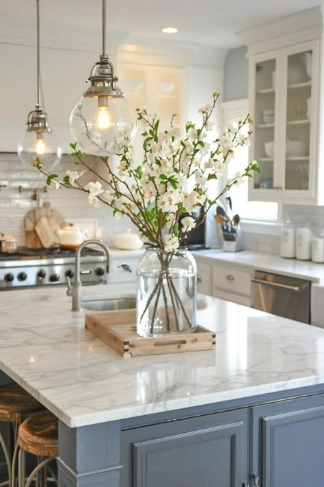 Kitchen Island Greenery, Marble Island Decor, Centerpiece Ideas For Kitchen Island, Decorate Island With Sink, Decorate Kitchen Island With Sink, Farmhouse Kitchen Island Centerpiece, Kitchen Island Styling Inspiration, Flowers On Kitchen Island, Long Kitchen Island Decor