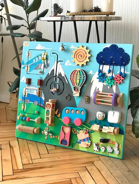 Sensory Boards For Preschoolers, Wall Mounted Busy Board, Handmade Busy Board, Activity Wall For Toddlers, Diy Sensory Boards, Baby Zintuiglijk, Fidget Board, Perlengkapan Bayi Diy, Baby Activity Board