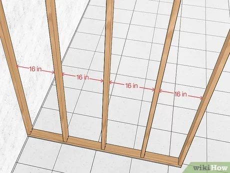 How to Build a Fake Wall: 12 Steps (with Pictures) - wikiHow How To Frame Out A Wall, How To Build A Stud Wall Diy, How To Build Interior Wall, How To Put Up A Temporary Wall, Build A Partition Wall, Build Fake Wall, Frame A Wall Diy, How To Build A False Wall, Framing Walls How To Build