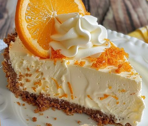 Orange Creamsicle Delight: No-Bake Cheesecake Orange No Bake Cheesecake, No Bake Creamsicle Cheesecake, No Bake Orange Creamsicle Cheesecake, Orange Creamsicle Dessert, Orange Dreamsicle Cake Recipe, Orange Creamsicle Pie, Orange Creamsicle Cheesecake Recipe, Orange Creamsicle Cheesecake, Refrigerator Desserts