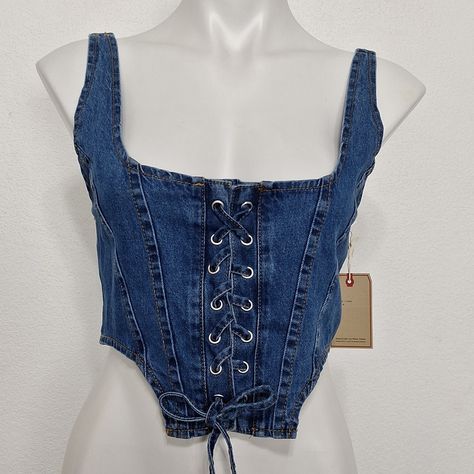 Lone Star Blue Lace Up Denim Corset Top New With Tags Garment: Corset Vest Color: Blue Size: Medium Features: Smocked Back Material: 100% Cotton Neckline: Square Neck Sleeve Length: Sleeveless Occasion: Casual, Going Out Closure: Lace Up Smoke/Pet-Free Home Measurements Are Approx, Laying Flat. Armpit To Armpit: 17" Shoulder To Hem: 16.5" *2796-Y Corset Vest, Denim Corset Top, Denim Corset, Star Blue, Coastal Cowgirl, Lone Star, Vest Top, Corset Top, Boho Tops