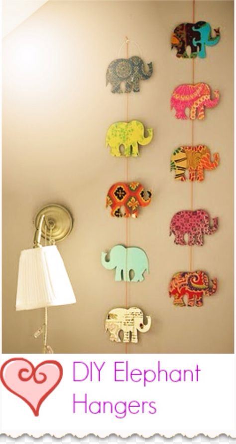 I don't know how you make the elephants (I think they are made out of wood) but you can just hand the elephants form a string and you just hang them in you room Diy Nursery Decor Girl, Elephant Garland, Perlengkapan Bayi Diy, Nursery Diy Projects, Elephant Decoration, Diy Dorm Decor, Elephant Wall Decor, Diy Nursery Decor, Easy Diy Room Decor