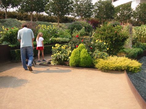 (Getty museum)  Decomposted Granite is the "dirt" path we are thinking of!  this website has lots of example pics and info on how to-  http://thehumanfootprint.wordpress.com/2009/07/10/dg-patios-decomposed-granite/ Decomposed Granite Patio, Crushed Granite, Decomposed Granite, Gravel Patio, Desert Garden, Patio Landscaping, Garden Path, Space Ideas, Garden Pathway