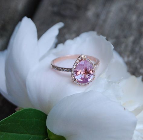 1.9ct Peach pink champagne tear drop sapphire and rose gold diamond engagement ring. $2,150.00, via Etsy. Sapphire Ring Engagement, Colored Sapphires, Peach Sapphire Rings, Pink Sapphire Engagement Ring, Wedding Wishlist, Sapphire Halo Ring, Peach Sapphire Engagement Ring, Pink Sapphire Ring Engagement, Rose Gold Diamond Ring Engagement