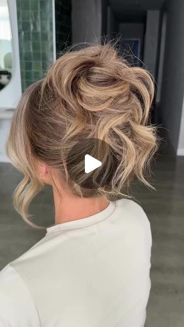 Salons Direct on Instagram: "YOUR HAIR UP INSPO ⚡⁣ ⁣ Watch as the talented @chantellemareehair shows you how to create this effortless, soft high bun on your clients. ⁣ ⁣ She uses the ghd Helios and Soft Curl Tong to prep the hair, available at salonsdirect.com 🙌⁣ ⁣ Don't forget to press the SAVE button & recreate this look for your clients next night out 💎⁣ --⁣ ⁣ #salonsdirect #hairup #updo #updohairstyle #ghd #ghdhelios #ghdsoftcurltong #hairupdo #hairtutorial #hairtutorials #hairstyletutorials" How To Messy Updo Long Hair, Hairdo Updo Messy, Formal Buns For Long Hair, Loose Hair Up, Effortless Updo Wedding, High Messy Bun Updo Wedding, Messy Hair Updo Wedding, Messy Bun For Wedding Guest, High Hair Updos Wedding