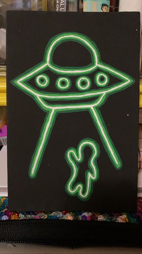 this was my very first painting <3 Simple Alien Painting, Simple Neon Paintings, Trippy Drawing Ideas Easy Led Lights, Black Light Painting Ideas Easy, Alien Painting Easy, Ufo Painting Easy, Painting Ideas Neon, Music Painting Ideas Easy, Neon Sign Painting Canvas Diy