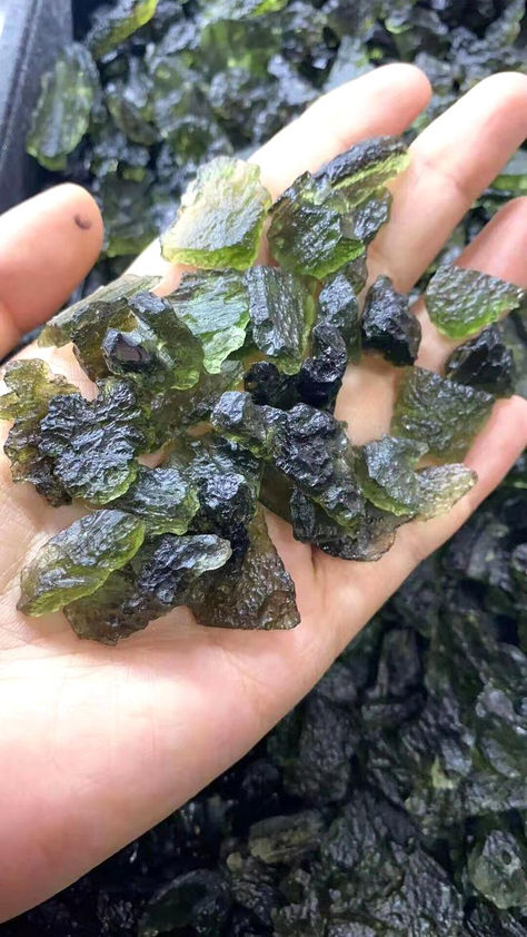 Discover the power of authentic Moldavite! Each unique piece, ranging from delicate chips to substantial chunks, is sold by weight in grams. Request an authenticity certificate in your order notes for peace of mind. Moldavite's enchanting green hues will not only protect but also mesmerize. Don't miss out - follow us for more crystal treasures! #MoldaviteMagic #CrystalProtection Moldavite Aesthetic, Moldivate Crystal, High Geologist, Crystal Moldavite, Magic Lightning, Moldavite Crystal, Green Aventurine Necklace, Fossil Bones, Moldavite Stone