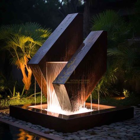 geometric fountain,metal fountain sculpture,outdoor fountain sculpture,outdoor fountain,garden fountain,garden fountain sculpture,geometric sculpture,modern fountain,modern outdoor fountain,fountain sculpture Modern Garden Sculpture Outdoor, Modern Outdoor Fountain Ideas, Waterfall Landscape Design, Modern Fountains Outdoor, Pool Statues, Front Yard Fountain Ideas, Pool Waterfall Landscaping, Contemporary Fountain, Garden Art Sculptures Statues