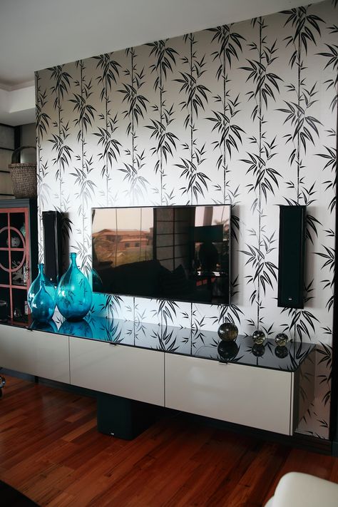 TV room create a backdrop behind the TV unit. #wallsdirect Tv Units With Wallpaper, Wallpaper Tv Unit Tv Walls, Tv Unit Design With Wallpaper, Tv Unit Wall Texture Paint, Tv Unit Wall Painting Ideas, Tv Unit With Wallpaper, Tv Unit Wallpaper, Wallpaper Behind Tv, Built In Tv Wall Unit