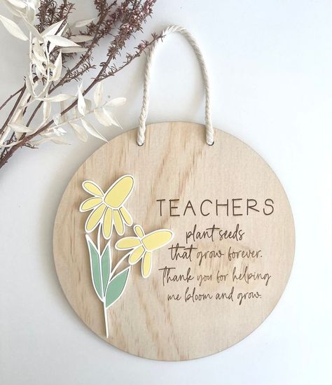 Are you looking for a unique and personalised teachers/educators gift?Our Personalised end of year teacher's gift will be a beautiful personalised end of year thank you gift to an educator and can be displayed year after year.Round Plaque wood sign personalised and with engraved message  or you can choose your own message to put in the plaque.Measures approx : 20cm  As Wood is a natural material. The colour and grain of the wood will vary. I don't have control of each piece of wood and the Wooden Personalised Gifts, Laser Cut Teacher Gifts, Wood Plaques Ideas Diy, Wooden Teacher Gifts, Teacher Thank You Gift Ideas, Wood Plaque Ideas Diy, Engraved Teacher Gifts, Unique Teacher Gifts, Teacher Gifts End Of Year