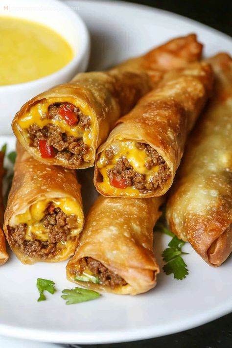 Garlic Butter Pizza Egg Rolls, Nacho Egg Rolls Recipe, Egg Roll Charcuterie Board, Nacho Egg Rolls, Egg Roll Recipes Chicken, Egg Rolls With Ground Beef, Texas Egg Rolls, Stuffed Nachos, Mexican Egg Rolls