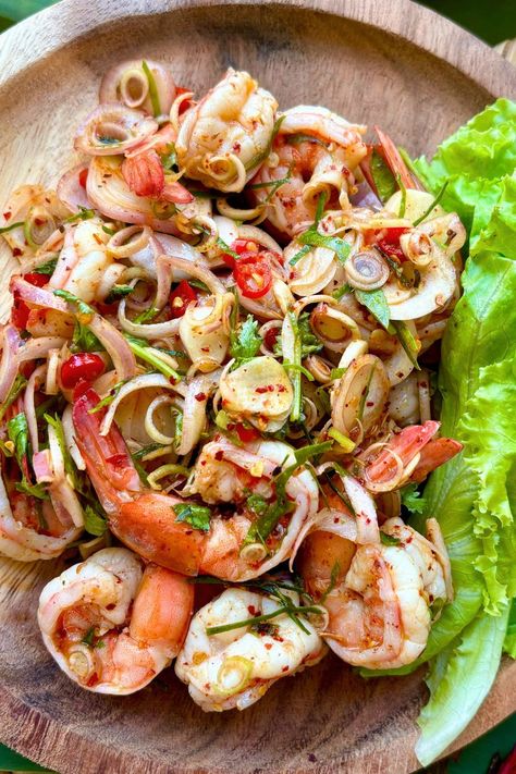 Try the Spicy Thai Shrimp Salad for a light and refreshing meal. It's loaded with healthy veggies and fresh herbs, dressed in a zesty Thai dressing, perfect for summer. Spicy Thai Shrimp Salad, Thai Shrimp Spring Rolls, Seafood Salads Cold, Asian Summer Food, Asian Seafood Salad, Shrimp Thai Salad, Thai Shrimp Appetizer, Summer Thai Recipes, Thai Dressing Salad