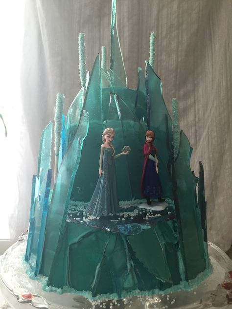 Frozen Ice Castle Cake- Elsa's Ice Castle- 3 tear cake covered in glass candy Elsa Ice Castle Cake, Princess Castle Cakes, Elsa Castle Cake, Easy Frozen Cake, Princess Birthday Cakes, Ice Castle Cake, Disney Princess Cakes, Cakes Princess, Castle Cakes