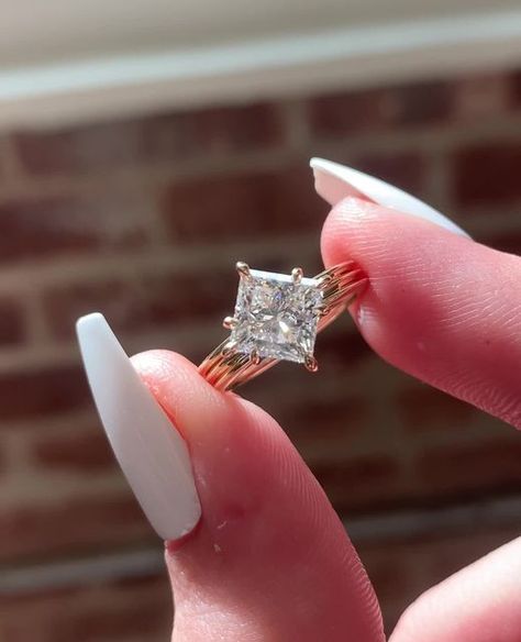 Elongated cushion cut engagement ring