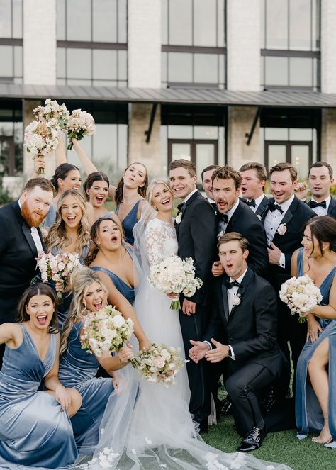 fun wedding party on wedding day at Omni Barton Creek Blue Tux Bridal Party, Blue Wedding Photography, Steel Blue And Black Wedding, Black Tuxedo With Dusty Blue, Dusty Blue Black And Gold Wedding, Light Blue Velvet Bridesmaid Dresses, French Blue And Black Wedding, Dusty Blue Bridesmaid Dresses And Black Suits, Black Suits Blue Dresses Wedding