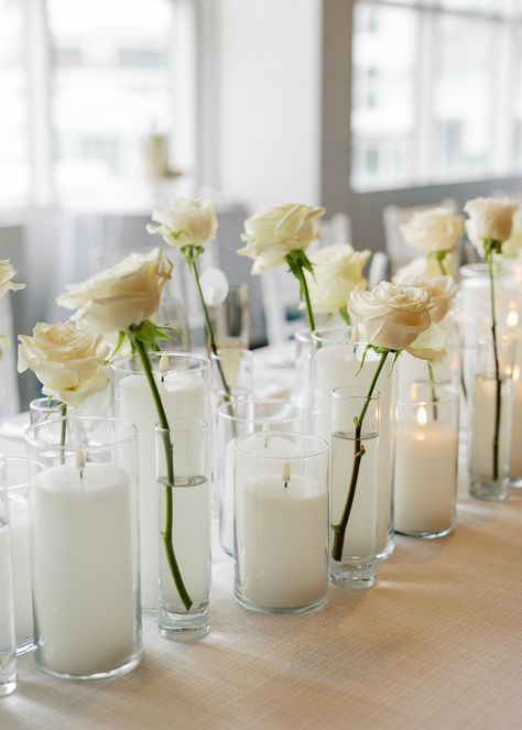 Cylinder Vases Wedding, Simple Single Flower Centerpieces, Single Stem Vase Centerpieces, Candles And Roses Centerpieces, Single Stem Flower Centerpieces, Wedding Single Flower Centerpieces, Simple Wedding Candle Centerpieces, Single Stem Table Decor, Single Roses Centerpieces