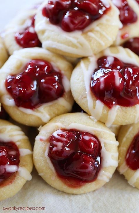 Cherry Pie Cookies - These cookies are made with sugar cookie dough and feature cherry pie filling. Our family loves these cookies! #cookies #cherrypie #dessert Group Dessert, Thumbprint Cookies With Icing, Cherry Pie Cookies, Almond Sugar Cookies, Cookies Chewy, Sour Cherries, Cookie Maker, Thumbprint Cookies Recipe, Cherry Cookies