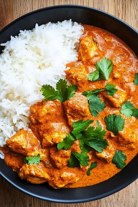 Indulge in the rich and aromatic flavors of chicken tikka masala with fluffy jasmine rice. This classic Indian dish is a perfect blend of tender chicken, creamy tomato curry, and fragrant spices. Treat yourself to a comforting homemade meal that's easy to make and will delight your taste buds. Elevate your dinner table with this delicious combination that guarantees a satisfying dining experience. Try this recipe today for a memorable culinary adventure that will transport you to the vibrant str Chicken Curry Masala, Tikki Masala Chicken, Indian Chicken Tikka Masala, Fluffy Jasmine Rice, Tikki Masala, Indian Takeout, Indian Chicken Curry, Chicken Tikka Masala Recipes, Tomato Curry