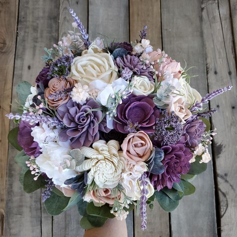 💥ALL SALES ARE FINAL💥 Wood Flower Bouquet, Purple Bridal Bouquet, Lavender Wedding Bouquets, Purple Wooden Flower Bouquet, Lavender Wood Wedding Flowers 🖌flower colors include cream, purple, dusty lavender, light pink, and blush 🤚handle is fully wrapped in twine with a cream ribbon overlay and stems are hidden underneath with artificial silver dollar eucalyptus 💐1st image shows our XLarge 12" bouquet 🥀cascading bouquet diameter is taken at the widest point at the top 📚PLEASE READ📚 •IMPOR Lavender Flower Bouquet, Christmas Wedding Bouquets, Wooden Flower Bouquet, Lavender Wedding Bouquet, Flower Bouquet Delivery, Lavender Bridal Bouquet, Purple Bridal Bouquet, Wood Flower Bouquet, Purple Wedding Flowers