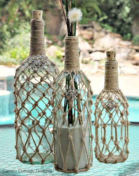 home decor wine bottle rope beachy ballard designs knockoff, crafts, repurposing upcycling Bottles With Flowers, Wine Bottle Project, Hantverk Diy, Wine Craft, Wine Bottle Art, Wine Bottle Diy Crafts, Wine Bottle Diy, Altered Bottles, Glass Bottle Crafts