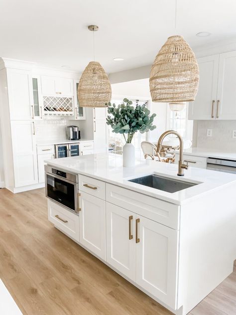 White Coastal Kitchen Remodel for 2022 - Just Simply Mom Coastal Chic Kitchen Island, Off White Small Kitchen, White Kitchen Cabinets Blonde Floors, Beach House White Kitchen, White And Gold Coastal Kitchen, White Kitchen With Light Floors, Beachy Kitchens Ideas, White Airy Kitchen, Light Airy Kitchen Ideas