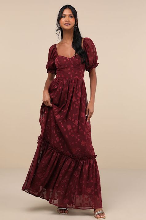 You'll radiate an exceptional essence all night long with the Lulus Phenomenal Sweetness Burgundy Floral Burnout Bustier Maxi Dress! Airy woven chiffon jacquard, with a burnout floral design throughout, shapes this romantic dress that features a bustier-inspired bodice with seamed cups, a sweetheart neckline, and short puff sleeves (with elastic at the shoulders and cuffs). The high, fitted waist tops a flowy, A-line skirt that cascades down to a tiered maxi hem. Hidden back zipper/clasp. Fit: T Boho Burgundy Dress, Big Skirt Dress, Dresses To Wear To A Wedding Modest, Lulus Red Dress, Boho Chic Wedding Dress Guest, Fall Floral Dresses, Country Wedding Guest Dresses, Long Dance Dresses, Modest Dresses For Wedding Guests