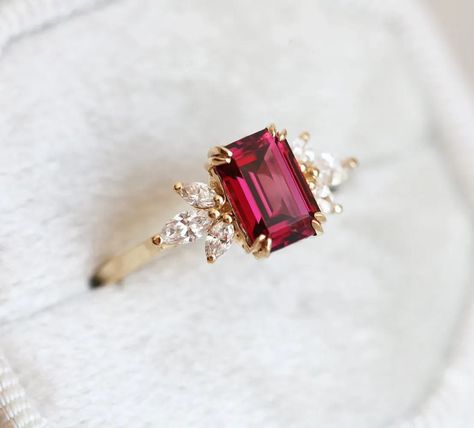 An engagement ring doesn't have to be a diamond. We take a look at 22 of our favorite alternative gemstones for unique engagement rings for 2022 brides and grooms. Garnet And Diamond Ring, Garnet Engagement Ring, Red Garnet Ring, Ruby Engagement Ring, Garnet Ring, Garnet Rings, Red Stone, Diamond Cluster, Red Garnet