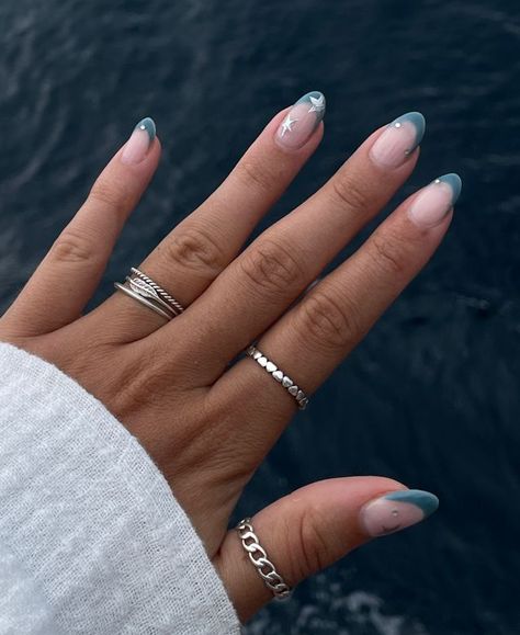 Sparkling Blue French Tip Almond Nails with Diamanté's and Silver Stars Blue French Tips With Stars, Blue French Tip Almond Nails, French Tip Nails With Stars, Tip Almond Nails, French Tip Almond Nails, French Tip Almond, Blue French Tip, Blue And Silver Nails, Blue French Tips