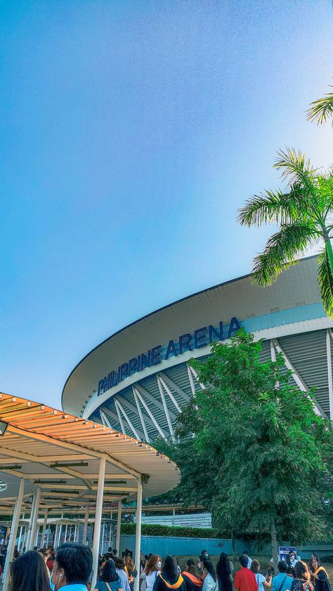 The Philippine Arena is the world's largest indoor arena. It is a multipurpose indoor arena with a maximum seating capacity of 55,000 at Ciudad de Victoria, a 140-hectare tourism enterprise zone in Bocaue and Santa Maria, Bulacan, Philippines about 30 kilometers north of Manila. Philippine Arena Aesthetic, Moa Arena Philippines, Manila Aesthetic Night, Manila Aesthetic, Prank Photos, Philippine Arena, Bulacan Philippines, Country Scenery, Aesthetic Family