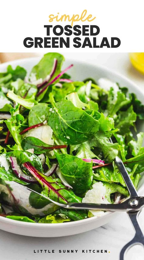 This is the best simple tossed green salad that goes so well with any meal! Fresh dressed greens with a simple lemon or apple cider vinaigrette, it will take you just a few minutes to make! Easy Green Salad Recipes, Tossed Green Salad, Fresh Green Salad, Green Salad Dressing, Little Sunny Kitchen, Sunny Kitchen, Leafy Salad, Leafy Green Salads, Easy Salad Dressing