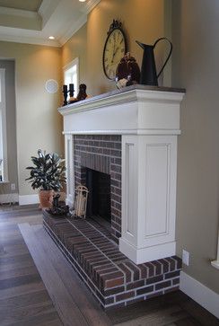 Red Brick Fireplace, Fireplace Molding, Raised Hearth, Traditional Fireplace Mantel, Fake Fire, White Mantle, Fireplaces Layout, Red Brick Fireplaces, Fireplace Redo