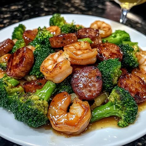 Honey Garlic Shrimp Sausage and Broccoli One Pot Garlicky Shrimp And Broccoli, Honey Garlic Shrimp And Broccoli Recipe, Easy Cheap Shrimp Recipes, Garlic Sausage Dinners, Light And Delicious Dinners, Broccoli Shrimp Recipes, Honey Soy Shrimp, Different Meals Dinners, Garlic Shrimp Broccoli