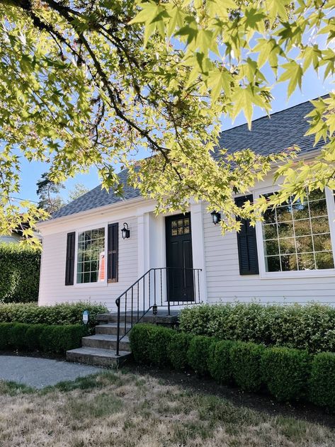 Cape Cod Windows Exterior, Cape Curb Appeal, Cape Cod Inspired Home, Navy Cape Cod House Exterior, Cape Cod White House Exterior, Cape Cod Before And After, Cape House Landscaping, Traditional Cape Cod Exterior, Cape Cod Home Design