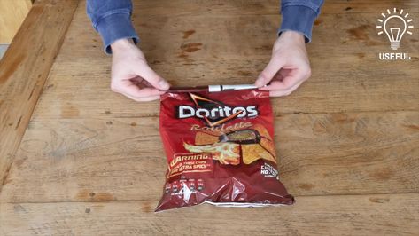 If you have run out of clips to close all those half-eaten bags of chips leftover from the weekend barbecue, check out this useful chip-clip-no-more bag fold! Folding Chip Bag Closed, Close Chip Bag Without Clip, Closing Chip Bag Without Clip, Fold A Chip Bag Without A Clip, Chip Bag Folding Hack, Fold Chip Bag, Fold Chip Bag Without Clip, How To Close A Chip Bag Without A Clip, Chip Bag Folding