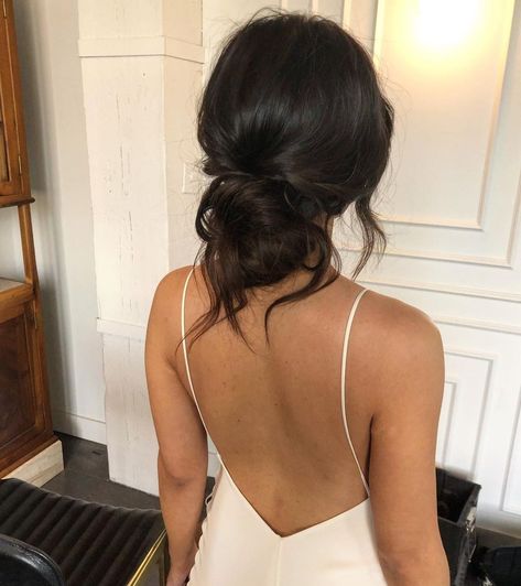 Messy Low Bun Bridal Hair, Bridal Hair Simple Bun, Bridesmaid Updo Black Hair, Lose Low Bun Hairstyles, Wedding Hair Spaghetti Strap Dress, Messy Low Bridal Bun, Wedding Updo Messy Bun, Hair With Open Back Dress, Messy Low Updo Wedding