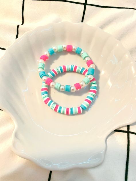 Hi, I am a small business owner and I am hand making these clay bead bracelets. They are very good quality,preppy and fashionable. I have a bracelet tiktok (@BeadsByBrynlie) account where you can see a lot of my creations. Please message me with any questions and to personalize your new bracelets today! Sees Bead Bracelets, Bracelet Inspo Clay Beads Preppy, Clay Bead Bracelet Ideas To Sell, Cute Preppy Bracelet Ideas, Cute Bracelet Ideas For Summer, Clay Bracelet Idea, Clay Bead Bracelet Designs, Cute Bracelet Ideas Diy, Clay Bead Bracelet Sets