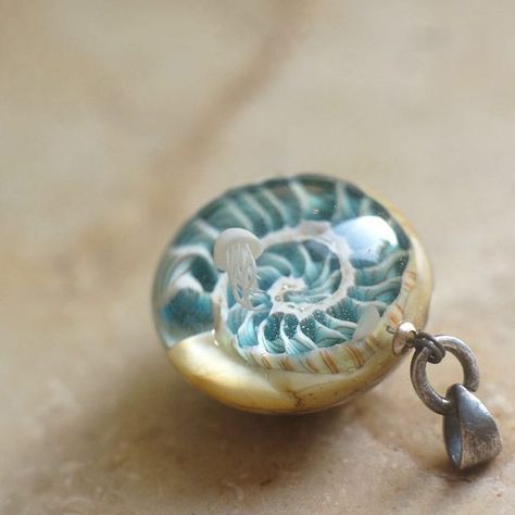 Ammonite (lampwork pendant by Businist) Lampwork Pendant, Underwater Life, Metal Work, Resin Jewelry, Resin Art, Sea Glass, Pocket Watch, Metal Working, Jewelry Inspiration