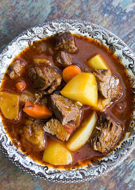 Short-Rib Beef Stew with Ale ~ Beef short-ribs, slow cooked and braised in brown ale. A hearty winter stew. ~ SimplyRecipes.com Beef Short Ribs Stew, Rib Stew Recipe, Short Ribs Stew, Short Rib Beef Stew, Short Rib Stew, Winter Stew, Beef Crockpot, Spaghetti With Ground Beef, Hungarian Goulash